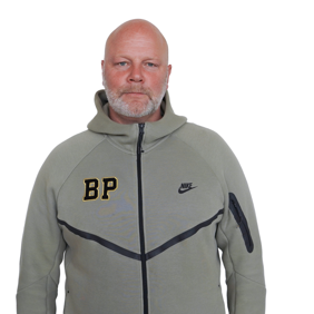 Porträttbild av Staffan Jacobsson, med vit bakgrund.
